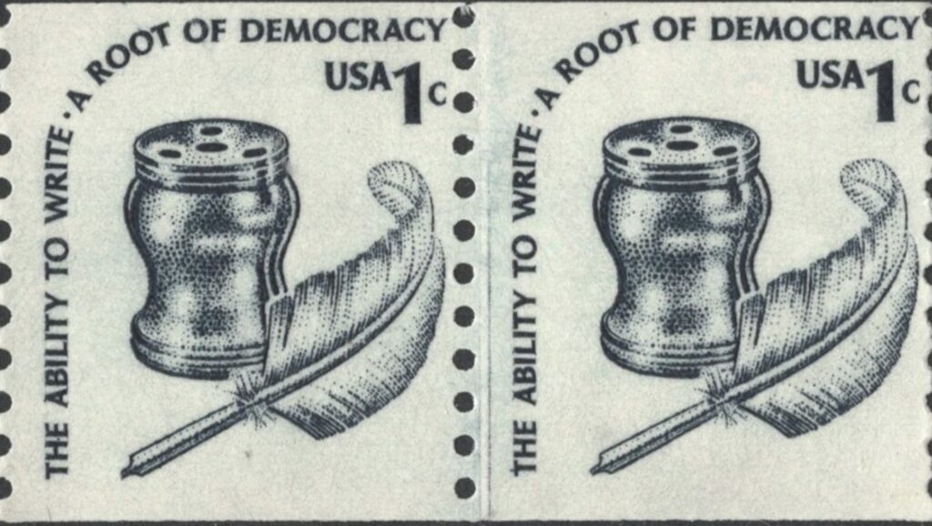stamp with quill pen and inkwell